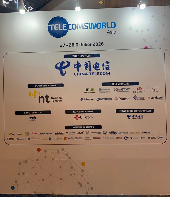 ป้ายรายชื่อ Official Partners ภายในงาน Telecoms World Asia 2026 ซึ่งมี VRITIMES ร่วมเป็น Media Partners อย่างเป็นทางการ