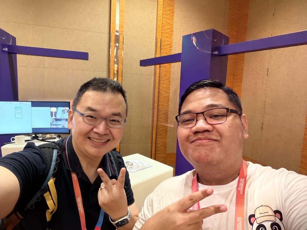 Founder Sion Abednego with visitors at the booth.