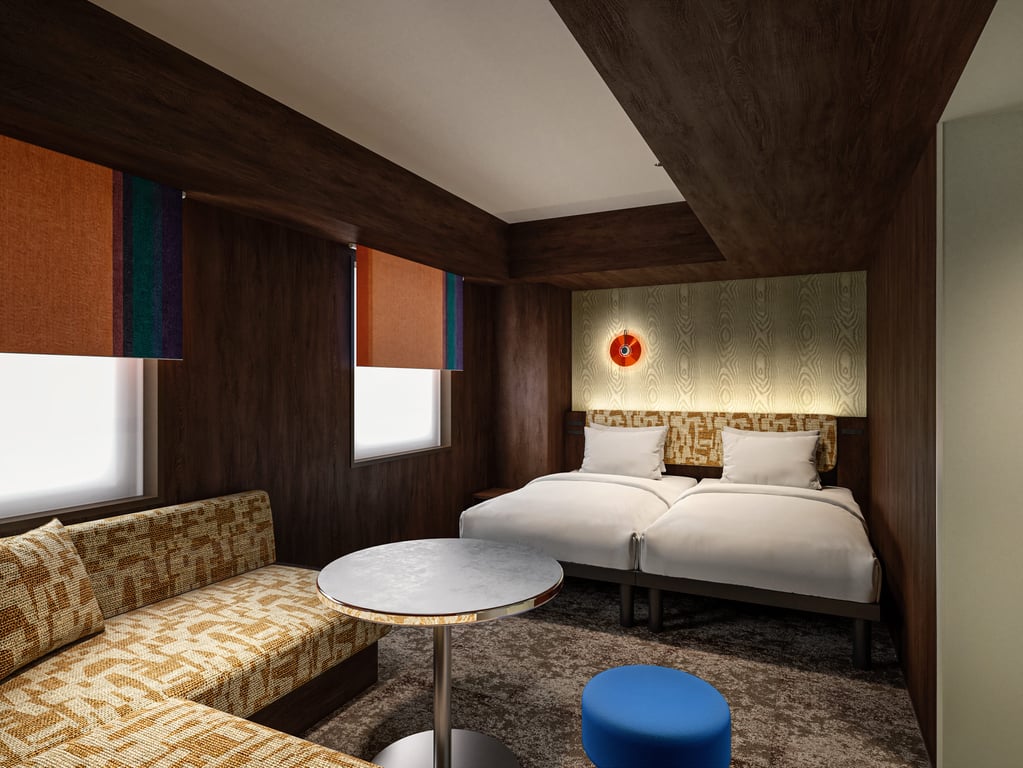 Guest rooms are themed around a “studio,” featuring flexible layouts designed for various stay styles in compact yet comfortable spaces
