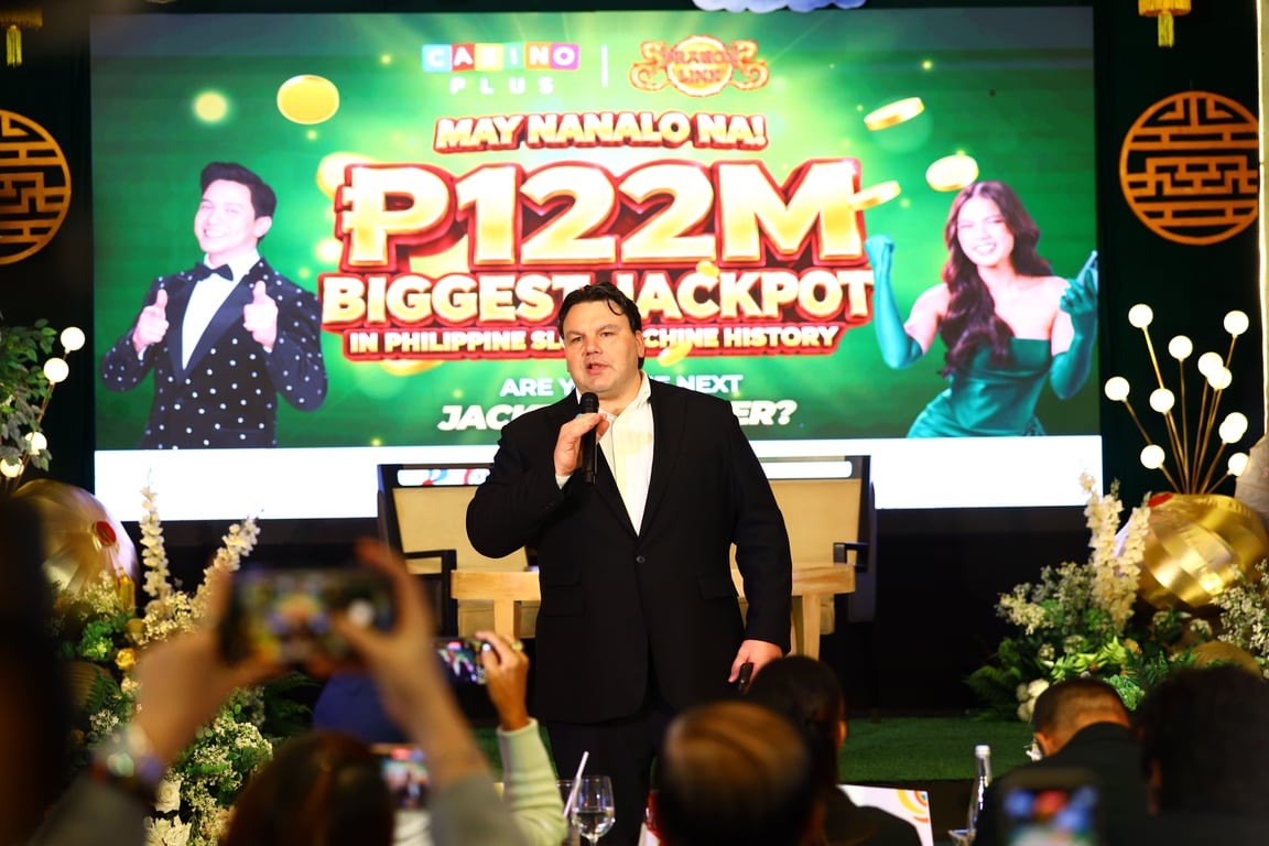 Casino Plus CEO Evan Spytma addresses guests, PAGCOR representatives, and members of the media during the ceremonial turnover of the ₱122.4-million Dragon Link jackpot on September 9, 2026.