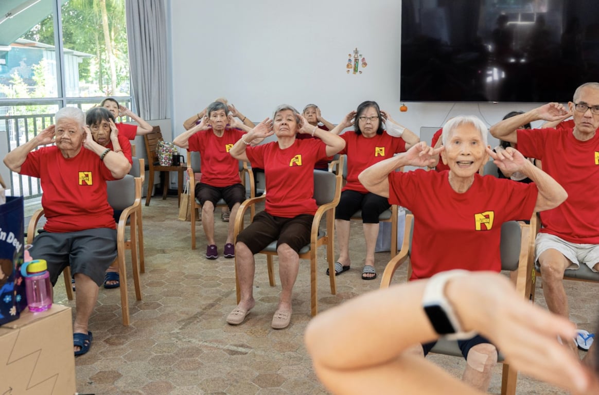 Seniors at Geylang East Home for the Aged during briefing and stretching period