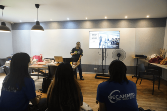   A PAWS staff member leads an animal welfare briefing for members of MECANMED's Philippine team at the PAWS Animal Rehabilitation Center in Quezon City. Photo courtesy of MECANMED.  