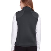 Back view of Ladies’ Loft Pioneer Hybrid Vest