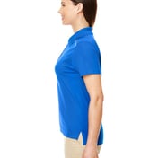 Side view of Women’s Radiant Performance Piquéé Polo With Reflective Piping