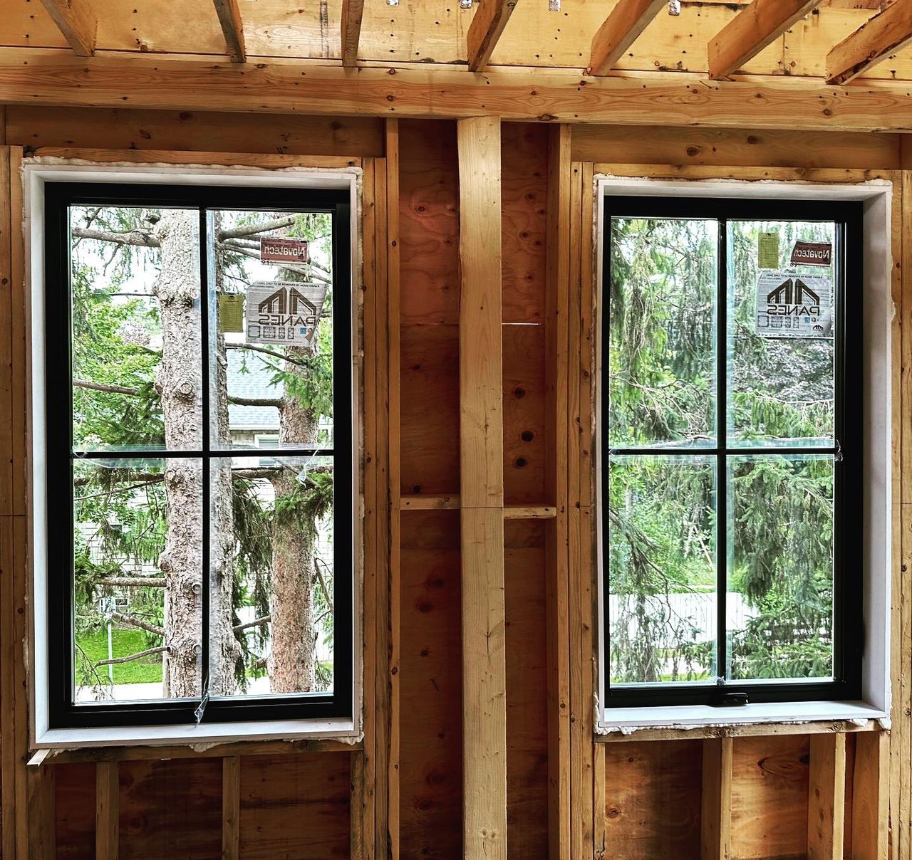 Black windows in an Aurora new-construction project