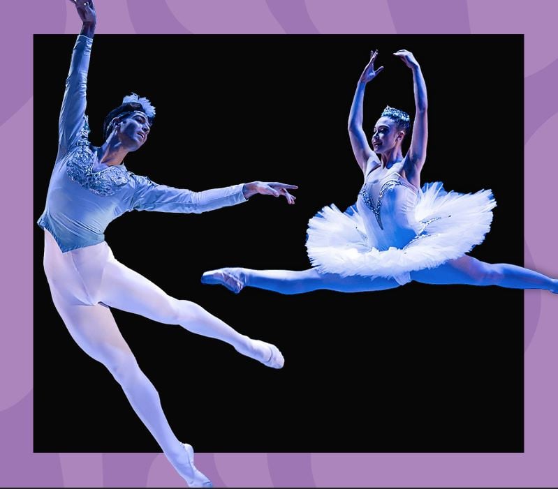 רקדן ורקדנית בלט עם תלבושות ריקוד בזמן קפיצה