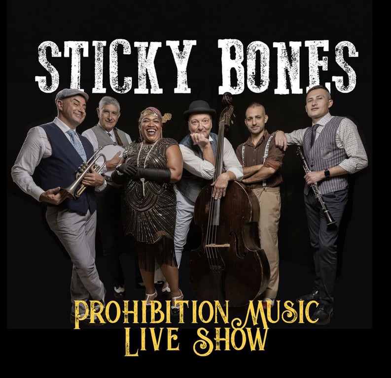 תמונה של לקת Sticky Bones בלבוש של שנות ה30, 40 וכלי נגינה