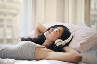 Woman wearing earphones
