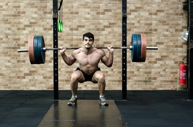 man working out with weights