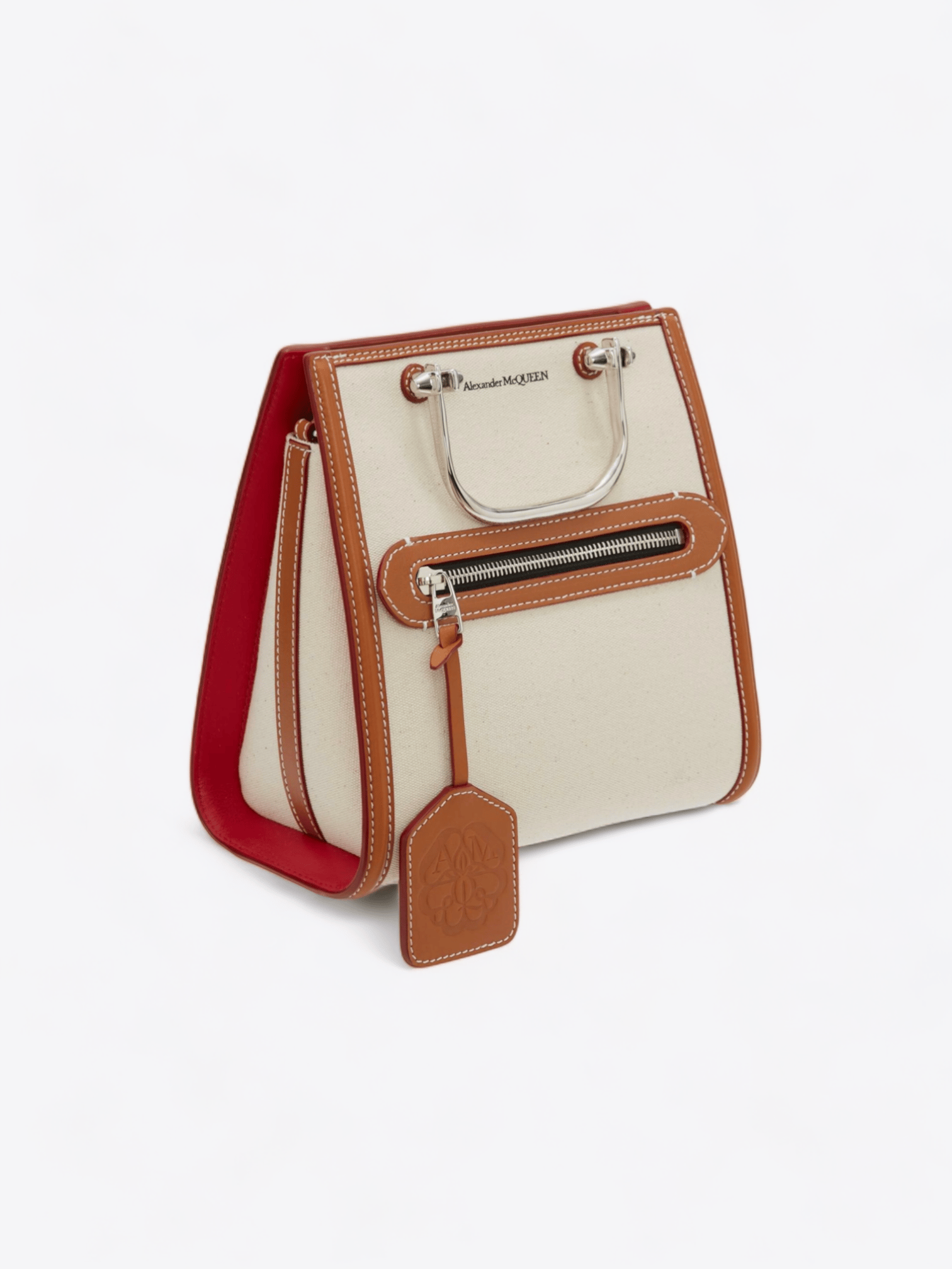 Strukturierte Alexander McQueen The Short Story Tasche aus elfenbeinfarbenem Leder mit Griffen und Schultergurt.