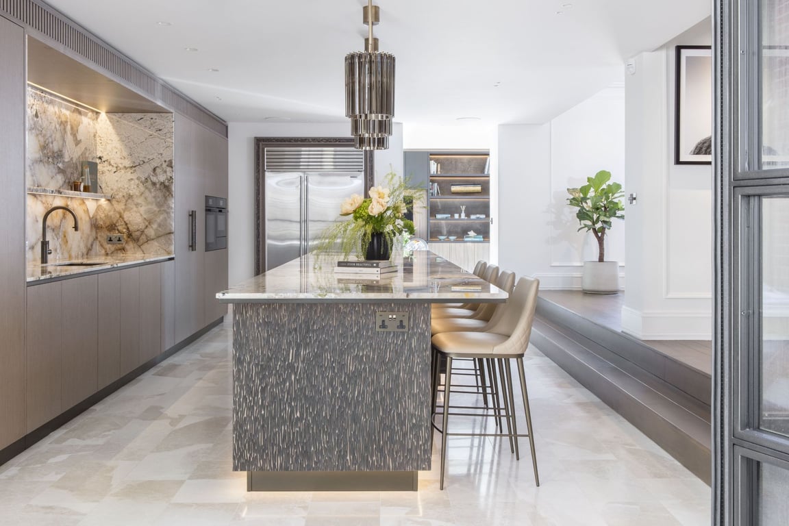 Contemporary kitchen island with sleek design and marble countertops