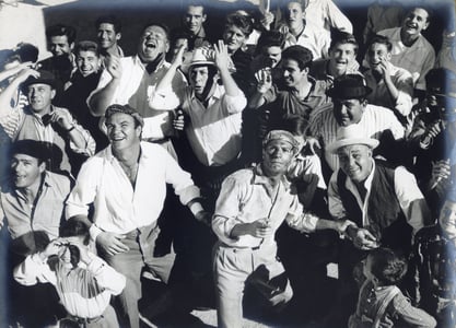 In the center, Nino Manfredi: Nino looking up the greasy pole.