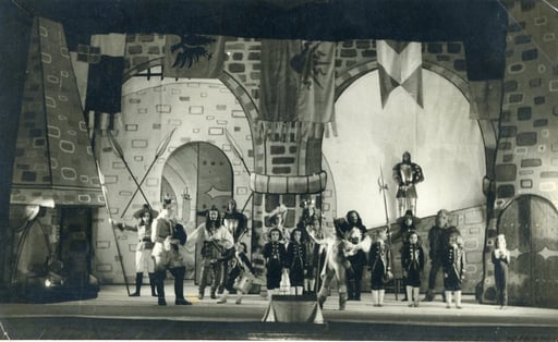 The second person from the left, wearing high boots, is the young Zeffirelli in the role of Domenico, dressed up as the Marquis of Carabà.