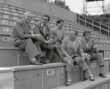 On the terraces built to host the audience: Pariso Votto - general manager of Maggio Musicale Fiorentino, director Luchino Visconti, writer and translator Gerardo Guerrieri, Emilio Amendola - manager of the theatre company, set designer Franco Zeffirelli.Photo by Gastone Bosio