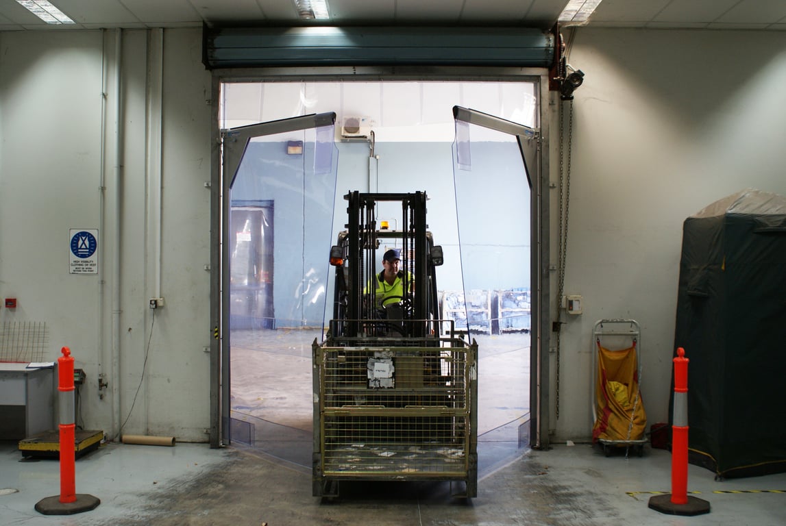 Coldshield 3000 Series warehouseinstall Image of Door Swing Coldshield FlexiblePVC 3000Series Double Frame