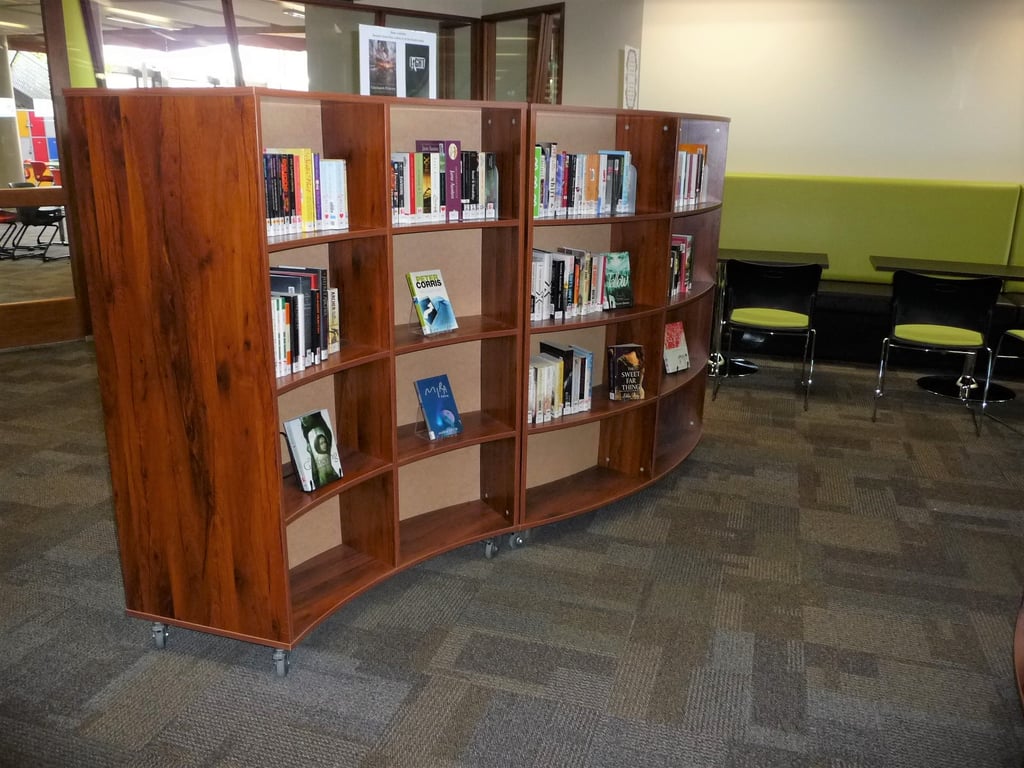 Suzanne Cory HS Library 1 Image of Shelving Library IntraSpace Wave 4Tier