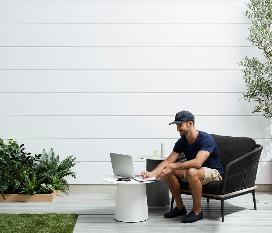 Stria Cladding 325mm White Vignette Home Office Man James Hardie Image of Cladding Board JamesHardie StriaCladding Vertical 405 GreyPebble