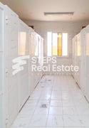 65 Rooms for Staff for Rent in Birkat Al Awamer - Labor Camp in East Industrial Street
