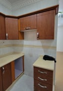 Unfurnished 1BHK for family includes karama - Apartment in Umm Ghuwailina