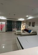 Stunning studio with sea view for sale in Porto Arabia - Studio Apartment in Porto Arabia