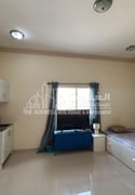 Elegant Studio including Utilities near Woqod - Apartment in Mamoura 18