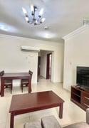 City Living: Furnished 2 BHK Gem with Balcony - Apartment in Al Mansoura