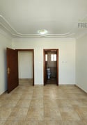 Prime Location: Unfurnished 2BHK Steps From Metro Access - Apartment in Al Mansoura