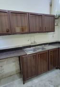 Unfurnished 1BHK  for family - Apartment in Umm Ghuwailina