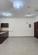 Cheapest || Unfurnished || 1BHK With Semi-Open Kitchen - Apartment in Umm Ghuwailina