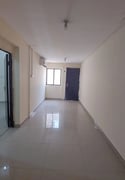 A long room and a large hall with a kitchen - Apartment in Al Duhail