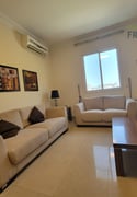 Furnished 2BHK for family with Balcony close metro - Apartment in Umm Ghuwailina