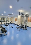 Spacious FURNISHED 1BHK For Family with Gym Access - Apartment in Umm Ghuwailina