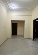 3-bedroom apartment and a living room with - Apartment in Al Gharafa