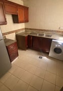 Semi furnished two bedroom building apartment for rent in al sadd - Apartment in Al Sadd