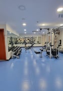 Spacious FURNISHED 1BHK For Family with Gym Access - Apartment in Umm Ghuwailina