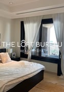 Beautiful 2BR Apartment In Ferrari Tower 7 Pearl - Apartment in Porto Arabia