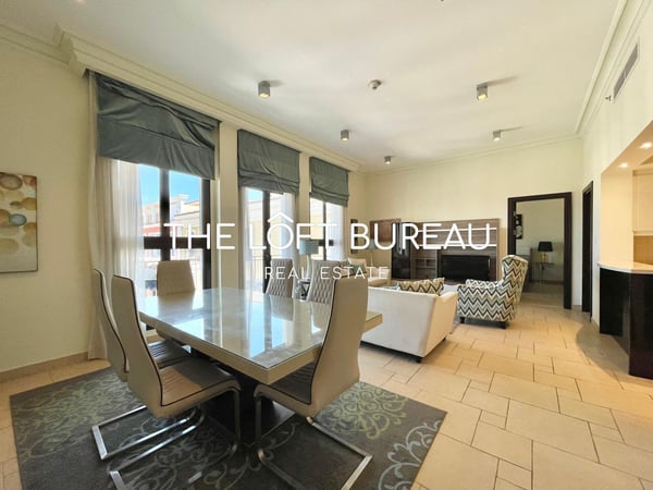 Captivating Canal Views: 2BR Paradise in The Pearl - Apartment in Qanat Quartier