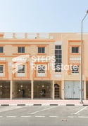 7 Shops + 8 Flats Building in Abu Hamour - Whole Building in Bu Hamour Street