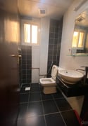 Semi furnished two bedroom building apartment for rent in al sadd - Apartment in Al Sadd
