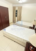 ELEGANTLY FURNISHED 2BHK APARTMENT - Apartment in Al Mansoura