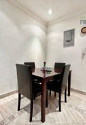 All-Inclusive Furnished 1BHK with Gym Access - Apartment in Al Sadd