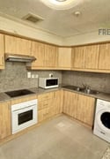 Spacious FF 1 BHK close to Metro For Families - Apartment in Regency Residence Musheireb