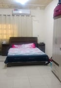 A room and a regular hall inside villa akitchen - Apartment in Salwa Road