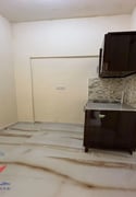 A large room and a hall with a separate kitchen - Apartment in Al Gharafa
