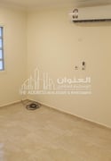 Economical Living: 2-Bedroom Comfort Zone - Apartment in Abdul Rahman Bin Jassim Street