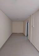 A large hall room with a kitchen and a comprehens - Apartment in Al Duhail