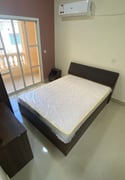 Semi furnished two bedroom building apartment for rent in al sadd - Apartment in Al Sadd