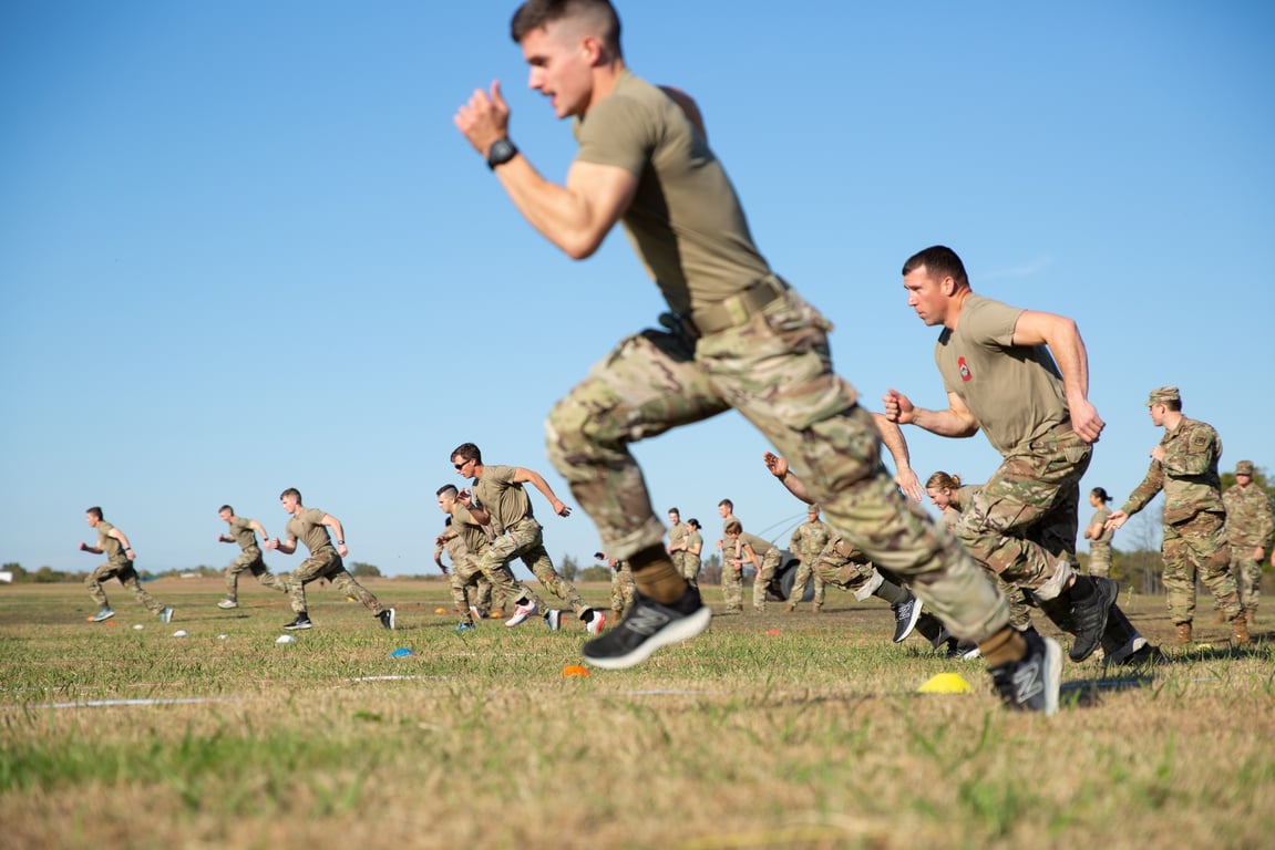 Army ROTC cadets sprint during the sprint-drag-carry event at the 5th Brigade Ranger Challenge