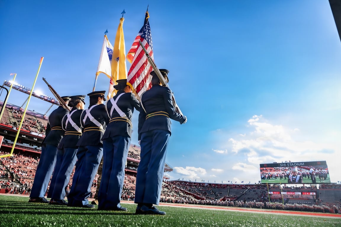 An Army ROTC guard of honor presents the colors at a university ceremony