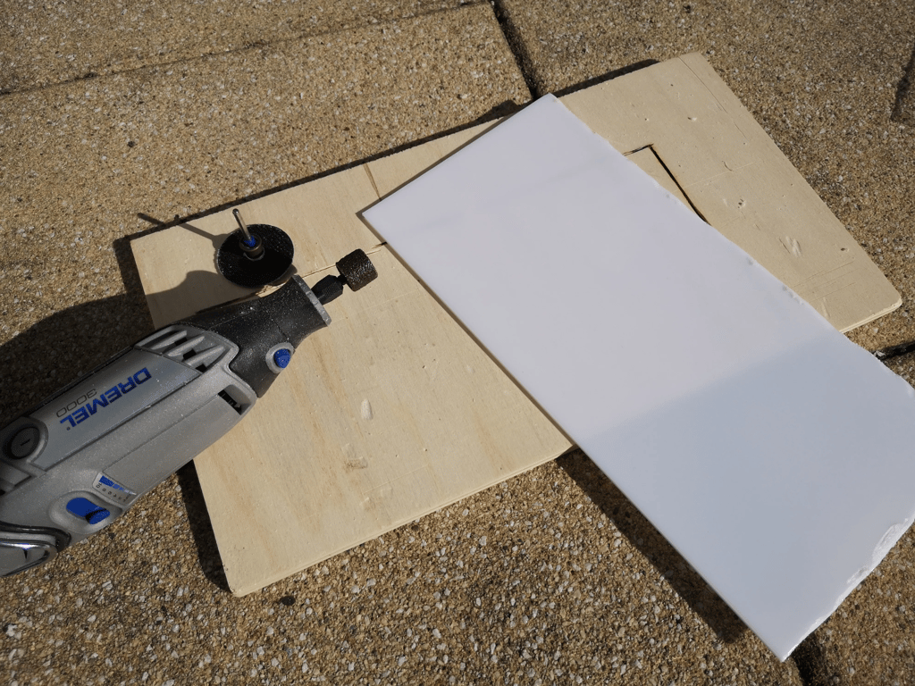 Cut an area corresponding to the size of the LED panel from the white plexi glass.